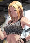  1girl bare_shoulders blonde_hair collarbone commentary dumbbell exercise gym hand_on_own_hip highres indoors light_blush medium_hair noah_(pixiv) original parted_lips sideways_glance snake_print solo sports_bra stomach sweat teeth toned 