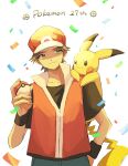  1boy anniversary baseball_cap black_eyes black_shirt brown_eyes brown_hair collarbone confetti ha01ru28 hat highres holding holding_poke_ball jacket on_shoulder pants pikachu poke_ball poke_ball_(basic) pokemon pokemon_(creature) pokemon_on_shoulder popped_collar red_(pokemon) red_headwear red_jacket shaded_face shirt short_hair spiked_hair v-shaped_eyebrows wristband 