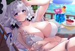  1girl armpits azur_lane bare_arms bare_shoulders bikini blue_eyes blush breasts cleavage collarbone drink hair_ornament highres illustrious_(azur_lane) large_breasts long_hair looking_at_viewer mole mole_under_eye navel ocean outdoors sitting solo swimsuit thigh_strap water wee_(weeyy) white_bikini white_hair 