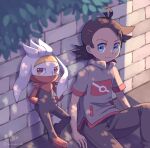  1boy antenna_hair arm_support blue_eyes brick_wall brown_hair closed_mouth commentary_request day eyelashes goh_(pokemon) grey_shirt highres ibusaki_(ivu) male_focus outdoors pants pokemon pokemon_(anime) pokemon_(creature) pokemon_journeys raboot shirt short_sleeves sitting smile 