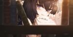  1girl bare_shoulders black_hair blue_archive blurry blurry_foreground book bookshelf commentary_request depth_of_field h2o_(dfo) hair_between_eyes halo hand_up heart heart-shaped_pupils highres holding holding_book long_hair looking_at_viewer open_book parted_lips purple_eyes solo symbol-shaped_pupils ui_(blue_archive) upper_body 