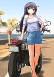  1girl aaoi ahoge alternate_costume black_hair blue_shorts blue_sky brown_eyes cloud day denim denim_shorts feet_out_of_frame hand_on_own_hip highres kantai_collection legs long_hair looking_at_viewer motor_vehicle motorcycle outdoors photo_background shirt shorts sky smile solo standing ushio_(kancolle) white_shirt 