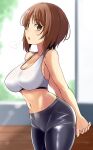  1girl arms_behind_back bare_arms bare_shoulders black_pants blurry blurry_background breasts breath brown_eyes brown_hair cleavage commentary_request cowboy_shot girls_und_panzer highres indoors kitayama_miuki large_breasts light_blush looking_at_viewer midriff navel nishizumi_miho own_hands_together pants parted_lips short_hair skin_tight solo sports_bra white_sports_bra yoga_pants 