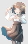  1girl :d breasts brown_eyes brown_hair brown_skirt comah grey_background grey_pantyhose hair_ornament hairclip hands_up highres holding jewelry long_sleeves original pantyhose pendant pleated_skirt puffy_long_sleeves puffy_sleeves shirt short_hair simple_background skirt small_breasts smile solo white_shirt 