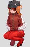  1girl animal_hat black_headwear blue_eyes blush bodysuit closed_mouth evangelion:_3.0_you_can_(not)_redo eyepatch grey_background hands_in_pockets hat highres jacket ll_c38 long_hair neon_genesis_evangelion orange_hair pilot_suit plugsuit rebuild_of_evangelion red_bodysuit simple_background solo souryuu_asuka_langley squatting track_jacket 