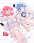  2girls ahoge aya02ka blue_hair breasts cellphone flower_brooch hair_ornament hairclip highres hololive hoshimachi_suisei hoshimachi_suisei_(1st_costume) medium_hair multiple_girls open_mouth phone pillow pink_hair sakura_miko sakura_miko_(1st_costume) short_shorts shorts side_ponytail sleeping smartphone virtual_youtuber 