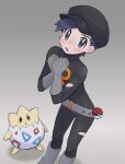  1boy :o alternate_costume belt black_bodysuit black_hair black_headwear blush bodysuit boots commentary_request ethan_(pokemon) gloves grey_belt grey_eyes grey_footwear grey_gloves hands_up hat highres looking_at_viewer male_focus open_mouth own_hands_together poke_ball poke_ball_(basic) pokemon pokemon_(creature) pokemon_(game) pokemon_hgss sana_(37pisana) short_hair standing sweatdrop team_rocket team_rocket_uniform togepi torn_bodysuit torn_clothes 