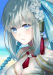  1girl absurdres beach bikini blue_eyes blue_ribbon blue_sky braid breasts cleavage commentary_request fate/grand_order fate_(series) flower grey_hair hair_flower hair_ornament hair_ribbon highres large_breasts long_hair looking_at_viewer morgan_le_fay_(fate) morgan_le_fay_(water_princess)_(fate) nakanohiro ocean official_alternate_costume outdoors ponytail ribbon rose sand shadow sidelocks sky solo swimsuit water white_bikini white_flower white_rose 