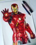  1boy anthony-c art_tools_in_frame artist_name blue_eyes clenched_hand english_commentary glowing highres iron_man iron_man_(series) iron_man_3 male_focus marker marker_(medium) marvel marvel_cinematic_universe mechanical_pencil open_hand pencil photo_(medium) power_armor realistic solo traditional_media 