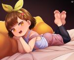  1girl barefoot bed_sheet black_background born-to-die brown_hair female_child hair_ornament hairband hairclip highres looking_at_viewer lying on_stomach open_mouth orange_eyes original pillow pomf short_hair smile soles solo teeth toes upper_teeth_only yellow_hairband 