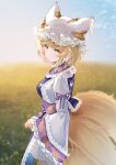  1girl animal_ears blonde_hair blush closed_mouth day dress fox_ears fox_tail frilled_sleeves frills from_side hat highres long_sleeves looking_at_viewer mob_cap multiple_tails outdoors sarasadou_dan short_hair solo tabard tail touhou white_dress white_headwear wide_sleeves yakumo_ran yellow_eyes 