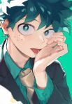  1boy black_jacket boku_no_hero_academia brown_necktie collared_shirt cream_on_hands cut_(nifuhami_35) freckles green_background green_eyes green_hair green_shirt highres jacket licking licking_hand long_sleeves male_focus midoriya_izuku necktie shirt short_hair simple_background solo tongue tongue_out 