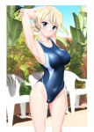  1girl absurdres arms_behind_head banana_tree blonde_hair blue_eyes blue_one-piece_swimsuit braid breasts chair commentary_request competition_swimsuit covered_navel cowboy_shot darjeeling_(girls_und_panzer) girls_und_panzer highres medium_breasts multicolored_clothes multicolored_swimsuit one-piece_swimsuit photo_background short_hair solo swimsuit takafumi twin_braids 