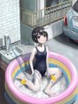  1girl absurdres black_eyes black_hair building car commentary_request day highres hose looking_at_viewer motor_vehicle okura_lino one-piece_swimsuit original outdoors rubber_duck scenery short_hair solo swimsuit urban wading_pool 