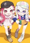  2girls :d asymmetrical_hair baseball_cap black_headwear black_shorts blue_shirt blunt_bangs blush boots bow brown_footwear clothes_writing collared_shirt colored_tongue commentary earrings fangs forehead green_shirt hair_bow hand_up hat heart heart_earrings heart_print highres ika_esu inkling inkling_girl jewelry light_purple_hair locked_arms long_hair long_sleeves looking_at_viewer multicolored_clothes multicolored_headwear multicolored_shirt multiple_earrings multiple_girls octoling octoling_girl open_mouth parted_bangs pink_eyes pink_hair pointy_ears polo_shirt purple_bow purple_eyes red_shirt shadow shirt short_eyebrows short_shorts shorts sidelocks simple_background smile splatoon_(series) standing stud_earrings suction_cups symbol-only_commentary teeth tentacle_hair tilted_headwear v v-shaped_eyebrows white_footwear white_shirt yellow_background yellow_shirt 