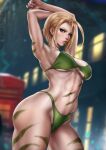  1girl ahoge arms_up artist_name blonde_hair blue_eyes blurry blurry_background bodypaint bow breasts cammy_white cowboy_shot dandon_fuga green_bow halterneck highres huge_ahoge large_breasts midriff navel short_hair solo street_fighter street_fighter_6 