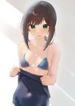  1girl bare_arms bare_shoulders bikini black_hair black_one-piece_swimsuit blue_bikini blush breasts collarbone covered_navel fubuki_(kancolle) green_eyes highres kantai_collection one-piece_swimsuit open_mouth sakieko school_swimsuit short_hair short_ponytail small_breasts smile solo swimsuit upper_body 