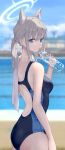  1girl absurdres animal_ear_fluff animal_ears aqua_eyes back_cutout blue_archive blurry blurry_background bottle breasts clothing_cutout competition_swimsuit grey_hair halo highres holding holding_bottle iwashi_111 looking_at_viewer looking_to_the_side median_furrow medium_breasts mismatched_pupils official_alternate_costume one-piece_swimsuit ponytail pool shiroko_(blue_archive) shiroko_(swimsuit)_(blue_archive) sidelocks solo swimsuit towel_on_one_shoulder two-tone_one-piece_swimsuit water_bottle white_towel wolf_ears 