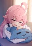 1girl ahoge blue_archive blush closed_eyes commentary_request crossed_bangs drooling fang feigning_sleep highres hoshino_(blue_archive) indoors lolikaku long_sleeves mouth_drool open_mouth pink_hair revision shirt shoulder_strap solo stuffed_animal stuffed_toy stuffed_whale upper_body white_shirt 