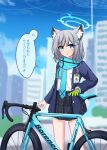  1girl absurdres animal_ear_fluff animal_ears bicycle black_skirt blue_archive blue_eyes blue_jacket blurry blurry_background breast_pocket building feet_out_of_frame gloves green_gloves grey_hair ground_vehicle highres id_card jacket lexis_yayoi long_sleeves looking_at_viewer mismatched_pupils open_clothes open_jacket open_mouth outdoors pocket scarf shiroko_(blue_archive) shirt shirt_tucked_in short_hair signature single_glove skirt solo speech_bubble standing translation_request white_shirt 