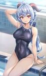  1girl ahoge alternate_costume blue_hair breasts closed_mouth commentary_request covered_navel ganyu_(genshin_impact) genshin_impact goat_horns highres horns kotatsu_(kotatsu358) long_hair looking_at_viewer medium_breasts pool school_swimsuit sitting skin_tight swimsuit 
