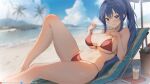  1girl azur_lane basket beach beach_chair bikini blue_eyes blue_hair blue_sky book breasts cloud cup dan-98 day high_ponytail highres large_breasts long_hair lying navel new_jersey_(azur_lane) on_back outdoors palm_tree pulled_by_self red_bikini sky solo stomach strap_pull swimsuit tree 
