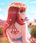  1girl aqua_eyes artezahn back_tattoo bandeau bare_back bare_shoulders blue_sky breasts cloud day desert flower from_behind genshin_impact highres looking_at_viewer looking_back medium_breasts nilou_(genshin_impact) outdoors parted_lips pink_flower red_hair sky solo tattoo upper_body 