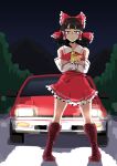  1girl ascot black_hair boots bright_pupils car closed_mouth commentary crossed_arms forest frilled_skirt frills full_body hair_tubes hakurei_reimu highres looking_at_viewer medium_hair motor_vehicle nature night outdoors red_eyes red_shirt red_skirt ribbon-trimmed_sleeves ribbon_trim sakamoto_fred shirt sidelocks skirt solo touhou white_pupils yellow_ascot 