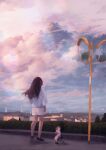  1girl absurdres animal blue_shirt brown_footwear brown_hair bush calico cat cloud cloudy_sky full_body highres house long_hair mirror original outdoors saisho_(qpoujr) shirt shorts sky solo urban white_shorts 