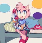  1girl :d amy_rose blue_shirt calling couch gloves green_eyes hairband looking_up motobug phone pillow red_hairband shirt shorts sitting smile solo sonic_(series) speech_bubble white_gloves 