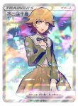  1boy :d bowknot_huhu brown_hair danganronpa:_trigger_happy_havoc danganronpa_(series) fujisaki_chihiro green_jacket green_ribbon jacket long_sleeves looking_at_viewer multicolored_background neck_ribbon orange_eyes otoko_no_ko pokemon_card ribbon short_hair smile solo translation_request 