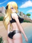  1girl :o ass beach bikini black_bikini blonde_hair blue_sky breasts building cloud cynthia_(pokemon) day english_commentary from_behind grey_eyes hair_ornament hair_over_one_eye jay156 large_breasts long_hair looking_back open_mouth outdoors pokemon pokemon_(game) pokemon_dppt sky solo swimsuit water wet 