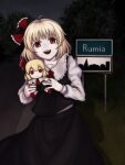  1girl absurdres black_skirt black_vest blonde_hair commentary doll english_commentary fangs fumo_(doll) hair_ribbon highres holding holding_doll long_sleeves looking_at_viewer name_connection night outdoors pale_skin poland real_world_location red_eyes red_ribbon ribbon road road_sign rumia shirt sign skirt smile solo touhou vest white_shirt zozoru 