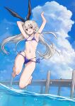  1girl :d armpits barefoot bikini black_hairband blonde_hair blue_bikini blue_eyes blue_sky breasts cloud commentary_request day hairband highres jumping kantai_collection long_hair looking_at_viewer ocean open_mouth outdoors shimakaze_(kancolle) side-tie_bikini_bottom sky small_breasts smile solo swimsuit takanashi_kei_(hitsujikan) toes 