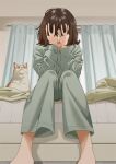  1girl barefoot bed brown_hair cat commentary_request covering_face curtains feet_out_of_frame green_pants green_shirt hands_on_own_face hands_up indoors knees_together_feet_apart lower_teeth_only mattaku_mousuke medium_hair messy_hair on_bed open_mouth original pants shadow shirt sitting sleepwear teeth twitter_username 