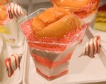  absurdres cup fish fish_request food food_focus fruit gelatin highres no_humans original peach peach_slice plate surreal tainosuke 