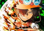  1boy absurdres artist_name bead_necklace beads black_hair commentary cowboy_hat english_commentary fire freckles hair_over_one_eye hat highres jewelry male_focus mygiorni necklace one_eye_covered one_piece orange_headwear portgas_d._ace short_hair skull smile solo teeth 