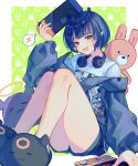  1girl animal_slippers book chyl fang handheld_game_console headphones headphones_around_neck highres holding holding_handheld_game_console hololive hololive_english hood hooded_jacket jacket ninomae_ina&#039;nis nintendo_switch pointy_ears shirt short_hair shorts slippers stuffed_animal stuffed_rabbit stuffed_toy takodachi_(ninomae_ina&#039;nis) virtual_youtuber white_shirt 