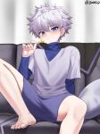  1boy barefoot blue_eyes blush closed_mouth commentary_request couch cushion grey_hair hair_between_eyes hand_up highres holding hunter_x_hunter indoors jjw1029 killua_zoldyck knees looking_at_viewer male_focus purple_shorts shirt short_hair shorts sitting smile solo spread_legs toes undershirt 