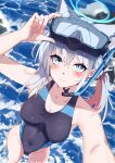  1girl absurdres animal_ear_fluff animal_ears black_one-piece_swimsuit blue_archive blue_eyes breasts competition_swimsuit covered_navel cross_hair_ornament diving_mask extra_ears feet_out_of_frame foreshortening from_above goggles grey_hair hair_ornament halo highres looking_at_viewer low_ponytail medium_breasts medium_hair mismatched_pupils multicolored_clothes multicolored_swimsuit official_alternate_costume one-piece_swimsuit shiroko_(blue_archive) shiroko_(swimsuit)_(blue_archive) smile snorkel solo swimsuit water wolf_ears xiao_an 