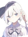  1girl :| black_bow black_hairband black_ribbon blue_eyes blunt_bangs blush bob_cut bow buttons closed_mouth collared_shirt eyes_visible_through_hair garasuno hair_behind_ear hair_tucking hairband highres konpaku_youmu looking_at_viewer ribbon shirt short_hair solo touhou white_hair white_shirt 