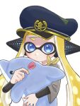  1girl agent_4_(splatoon) blonde_hair blue_eyes blue_headwear candy closed_mouth commentary_request food grey_shirt hat highres holding holding_candy holding_food holding_lollipop holding_stuffed_toy inkling inkling_girl lollipop long_hair looking_at_viewer mina_p shirt simple_background solo splatoon_(series) splatoon_3 stuffed_animal stuffed_dolphin stuffed_toy tentacle_hair upper_body white_background 