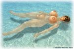  1girl 2003 areolae artist_name breasts cowper's_gland curvy eyes_closed floating huge_breasts large_areolae large_breasts nipples nude phaia puffy_nipples short_hair solo spunky_knight water youhei_kozou 