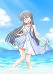  akiyama_mio beach black_eyes black_hair blue day dress k-on! kikujin long_hair one_eye_closed outdoors skirt_hold solo wading water 