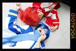  akaito blue_hair cosplay crossdressing headphones kaito multiple_boys photo red_hair scarf vocaloid 