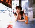  1girl asian black_eyes bracelet breasts chin_rest cleavage jewelry large_breasts long_hair looking_at_viewer outdoors photo softdrink solo_focus straw table 