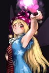  1girl alternate_eye_color american_flag_dress arm_up armpits bare_arms black_background blonde_hair blue_dress blush breasts brown_eyes clownpiece commentary_request dress fairy_wings gengoroumaru_(ambidextrous) hair_between_eyes hand_on_hip hat highres holding holding_torch jester_cap long_hair looking_at_viewer medium_breasts neck_ruff polka_dot_hat purple_hat red_dress revision simple_background smile smirk solo star star_print striped striped_dress torch touhou uneven_eyes upper_body very_long_hair wings 