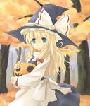  autumn blonde_hair blue_eyes blush hat jack-o'-lantern kirisame_marisa object_hug pumpkin solo tes_(unpre) touhou tree witch_hat 