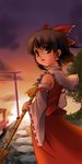  broom cloud detached_sleeves hakurei_reimu outdoors pesi sky solo sunset torii touhou tree 