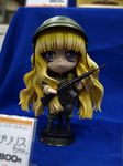  chibi figure gun helmet highres lilith_(yamibou) long_hair military photo solo uniform very_long_hair weapon yami_to_boushi_to_hon_no_tabibito 